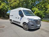 a white van that is parked on the side of the road