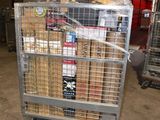 a metal cart with a bunch of boxes in it