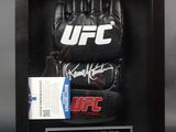 signed framed ufc glove display in a black shadow box