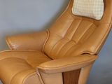 brown leather reclining chair with foot rest and foot rest
