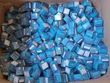 a cardboard box filled with blue boxes of cigarettes
