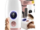 the woman is holding a pink and white device in her hand