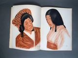 an open book with a drawing of a woman and a man