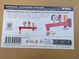 a close up of a box with a label on it with a picture of a pressure gauge