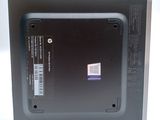 a black box with a sticker on it on a white surface