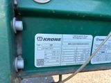 a close up of a green machine with a price tag
