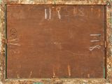 an old wooden board with writing on it sitting on a table
