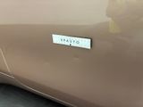a close up of a car with a sticker on it