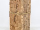 a large wooden box with a label on it