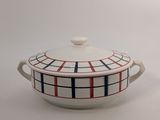 an oval casserole dish with a red, white and blue design