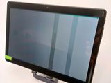 a tablet that is sitting on top of a stand