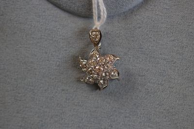 Pendentif soleil en or blanc pavé de 14 diamants taille bril…