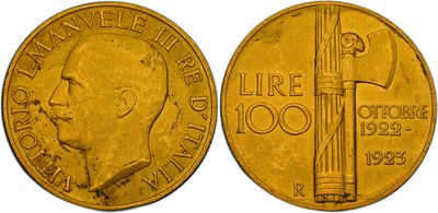 a close up of a gold coin with a hammer on it