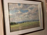 a picture of a painting hanging on the wall