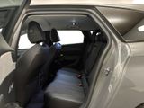 a car that has the door open and the seats down