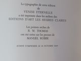 a close up of a book with writing on it