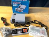 a nintendo game system sitting on top of a wooden table