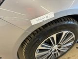 a close up of a car with a sticker on the side of it