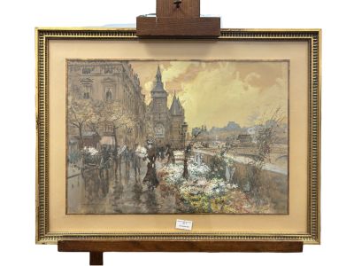 an image of a painting on a easel with a picture of a city