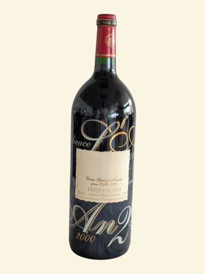 a bottle of wine that is sitting on a table