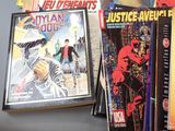 a lot of comic books sitting on a table