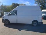 a white van that is parked in a parking lot