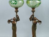 pair of antique bronze and green glass lamps on wooden bases