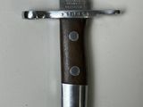a knife that is laying on top of a table