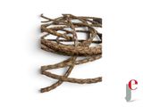 a close up of a bunch of twigs on a white surface