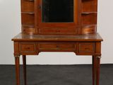 an image of a wooden desk with a mirror on top of it