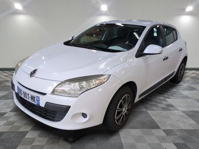 a picture of a white car parked in a garage