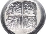 an image of a silver coin with a cross on it