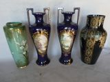 three vases are sitting next to each other on a table