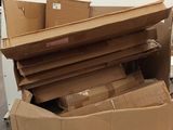 a pile of cardboard boxes sitting on top of each other