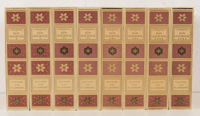 six books in a row on a table with a white background