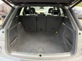 a trunk of a car with the doors open