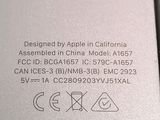 the back of an apple iphone with a small battery on it