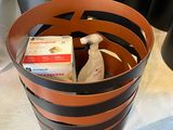 a bucket that has some items inside of it