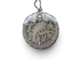 silver pendant with a bird on a branch and a fish in the middle