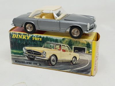 a toy car that is sitting on top of a box