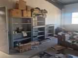 a room with a lot of boxes and boxes on the floor