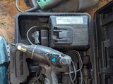 many tools that are sitting in a box on the floor