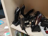 a shelf with a bunch of electronics on top of it