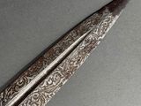 a close up of a knife on a table