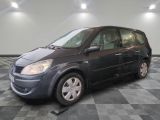 a picture of a gray car parked in a garage