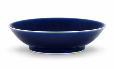 blue and white bowl on a white background with a white background