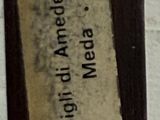 a close up of a label on a wall