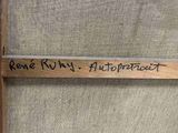 a close up of a piece of wood with writing on it