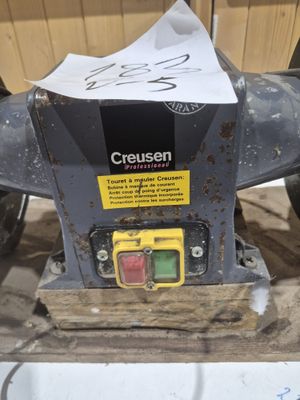 a picture of a close up of a machine with paper on it