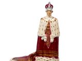 an image of a figurine of a king wearing a crown
